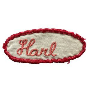 Vintage Name Patch Harl Embroidered Red Letters Oval 3" Across